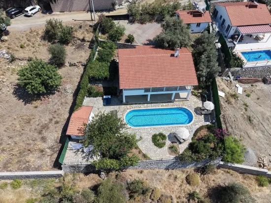 Вилла 4+1 с видом на озеро и море на продажу в Dalyan Gökbel