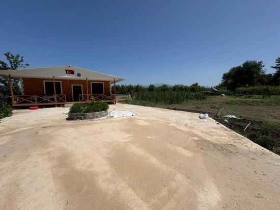 Отдельно Стоящий Деревянный Дом Площадью 120 М² На Участке Площадью 2500 М² В Районе Дальян Карадаг.