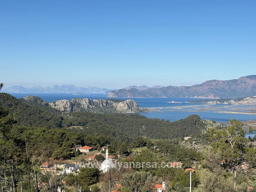 Gökbel'de Köy Yerleşik Alanı İçerisinde Deniz Manzaralı 1000m2 Satılık Arazi