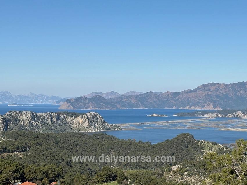 Gökbel'de Köy Yerleşik Alanı İçerisinde Deniz Manzaralı 1000m2 Satılık Arazi