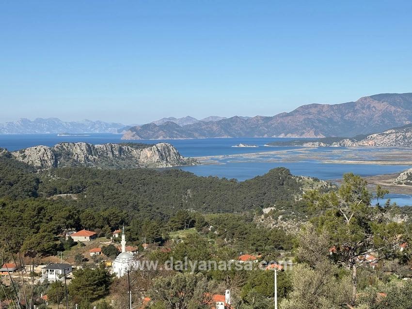 Gökbel'de Köy Yerleşik Alanı İçerisinde Deniz Manzaralı 1000m2 Satılık Arazi